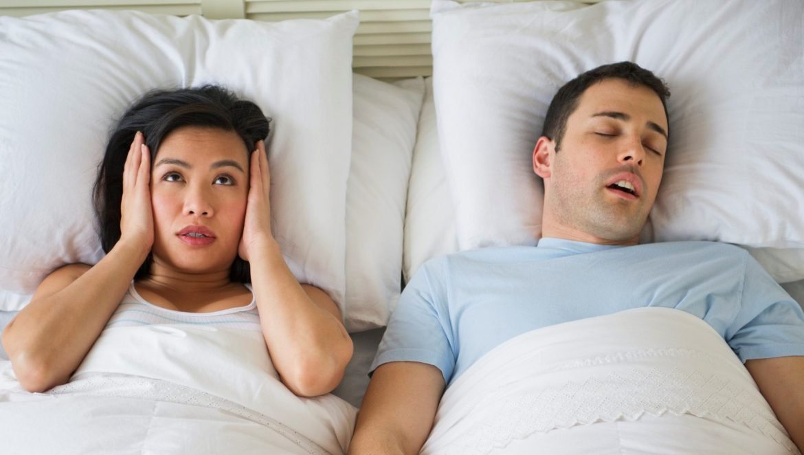 how to stop someone from snoring without waking them up